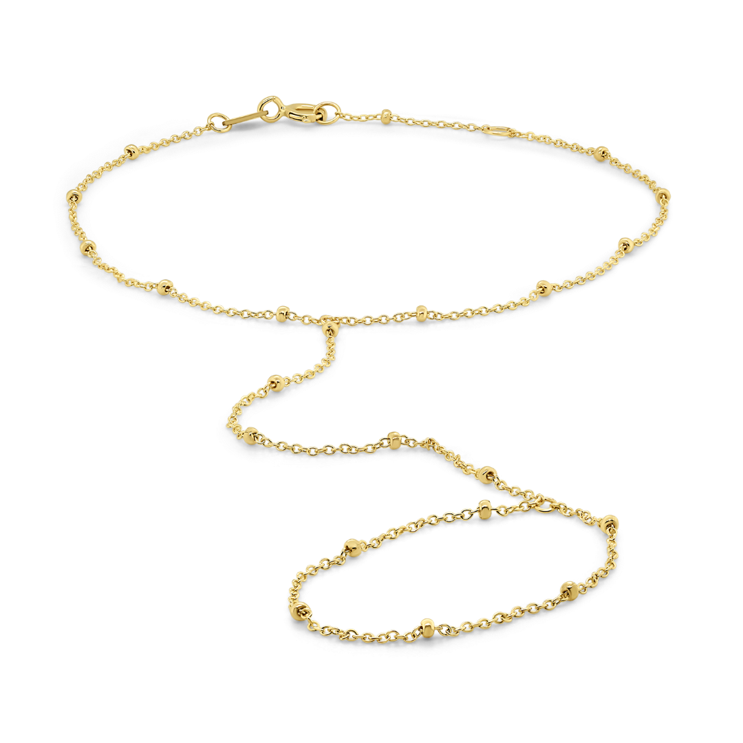 Brățară cu biluțe din aur galben de 14K